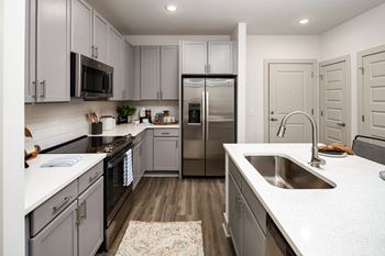 Gourmet kitchens with designer subway tile backsplashes
